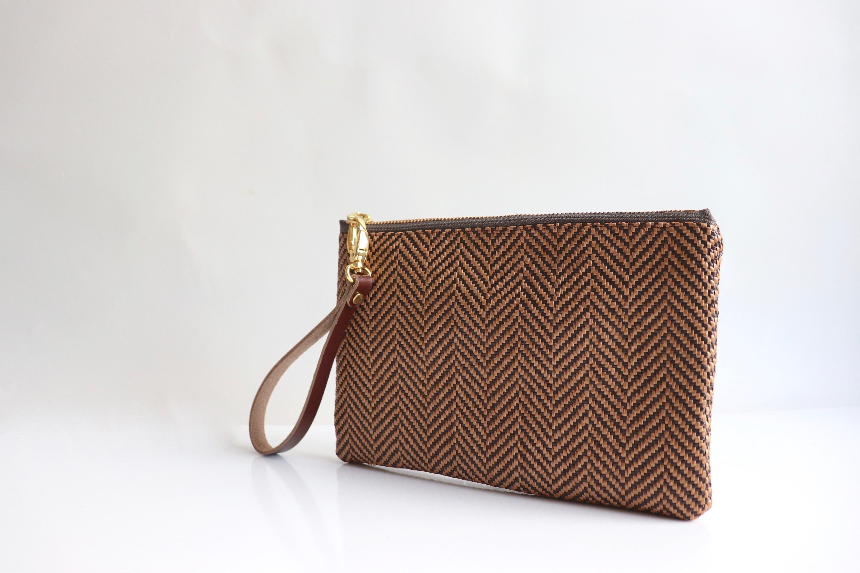 Woven deals clutch purse