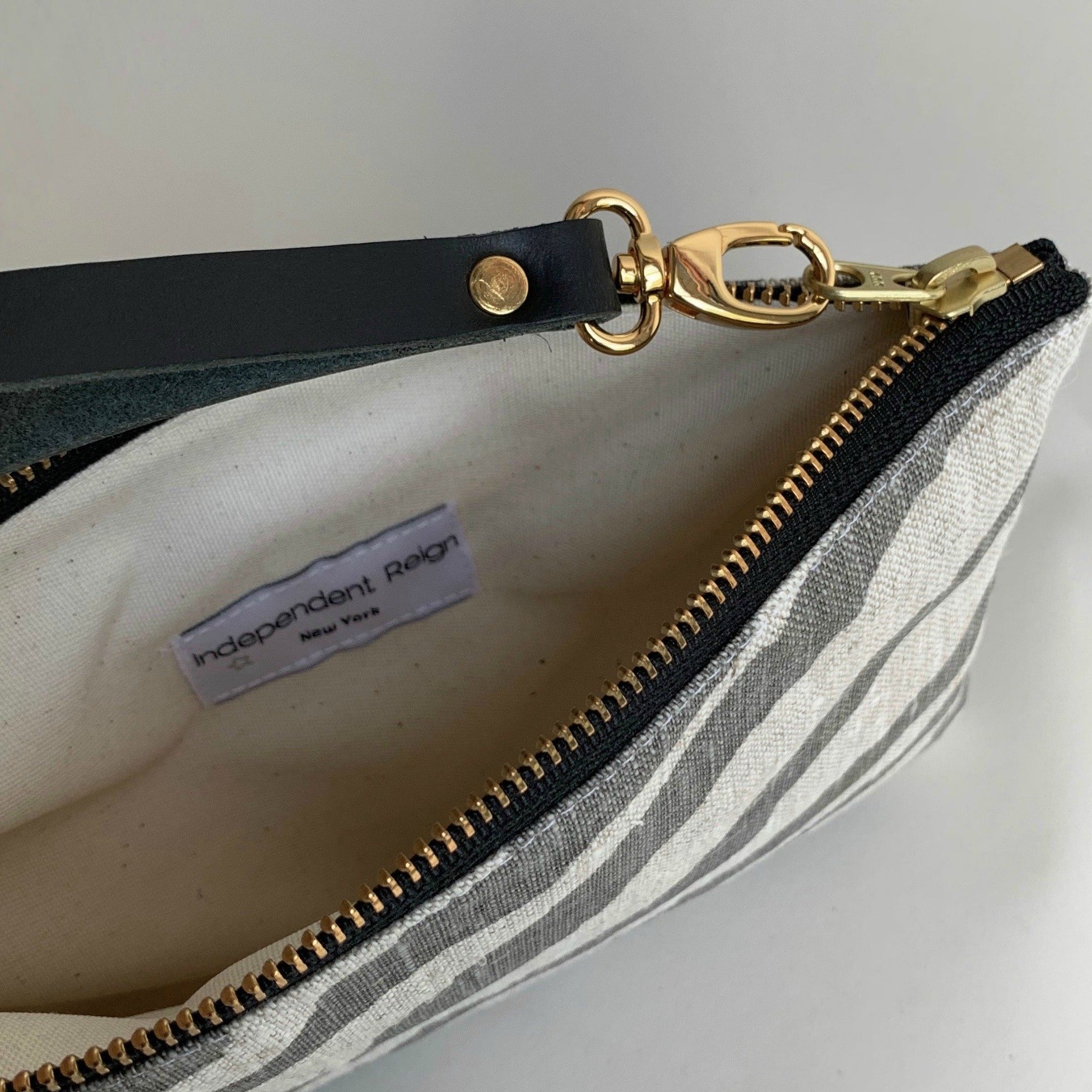 Zebra Striped Clutch Bag by Independent Reign